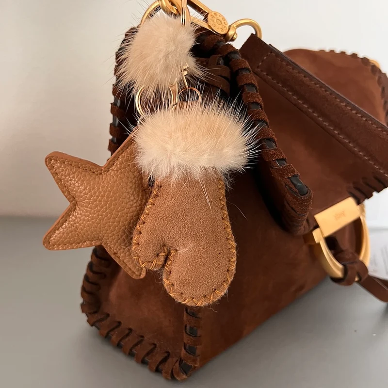 Taschen Anhänger Fell Handschuh Star